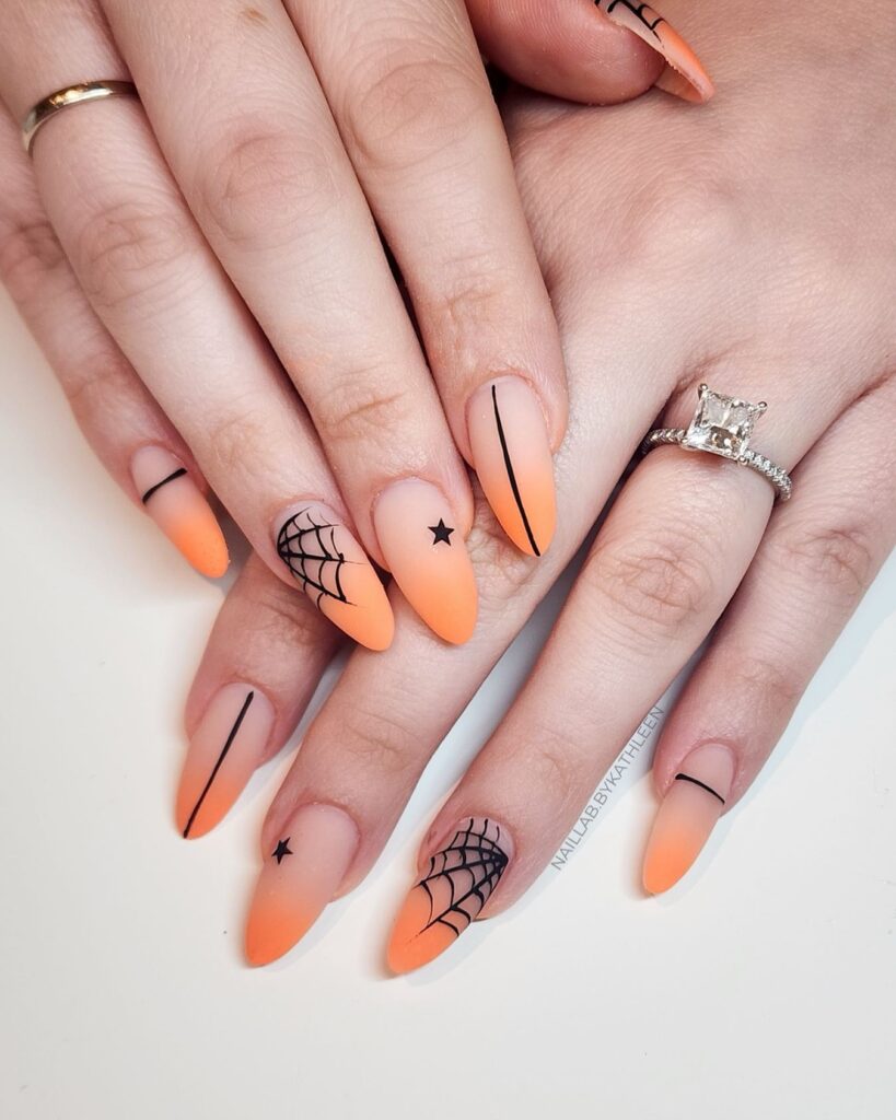 Bewitching Webs & Stars halloween nails