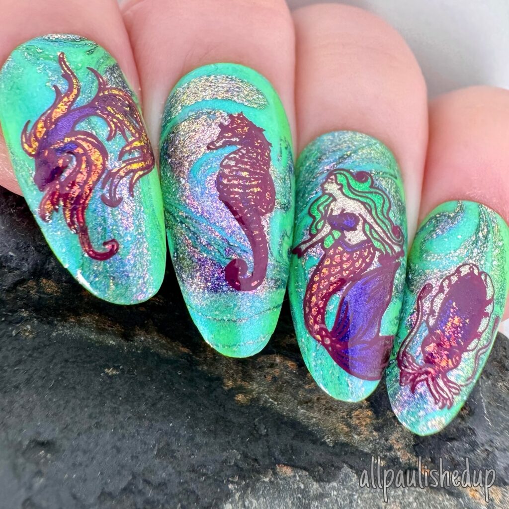 Green mermaid water marble mani